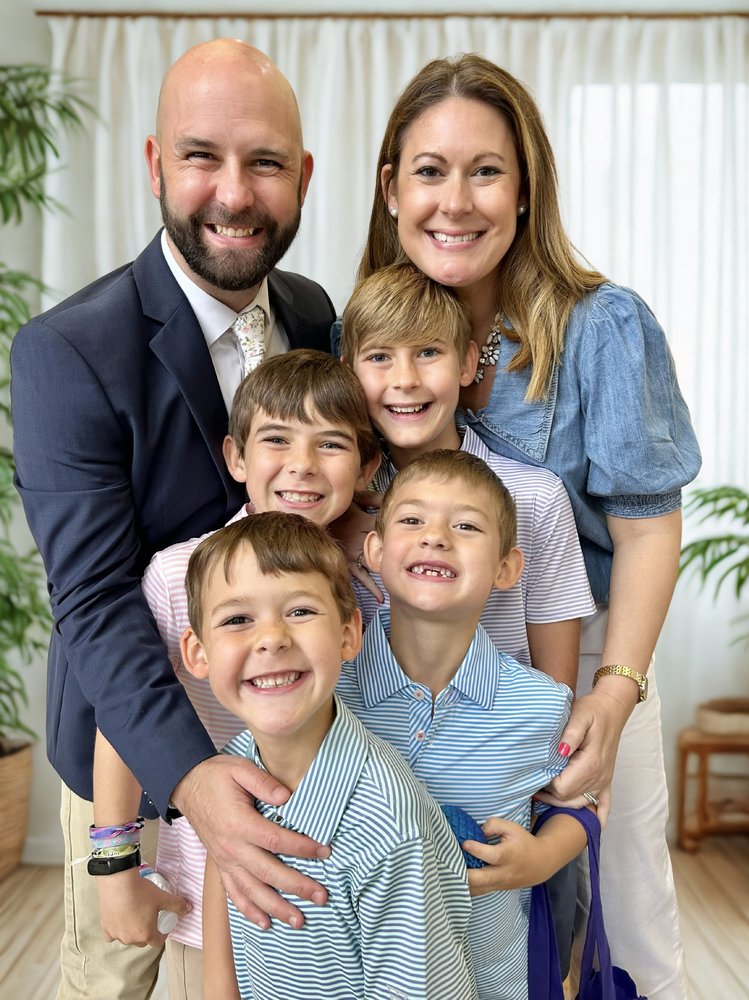 Rebecca Fletcher with her husband Jonathan and their four sons